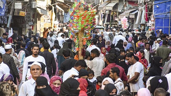 <div class="paragraphs"><p>Large crowd at a market ahead of the Eid-ul-Fitr festival.&nbsp;</p></div>