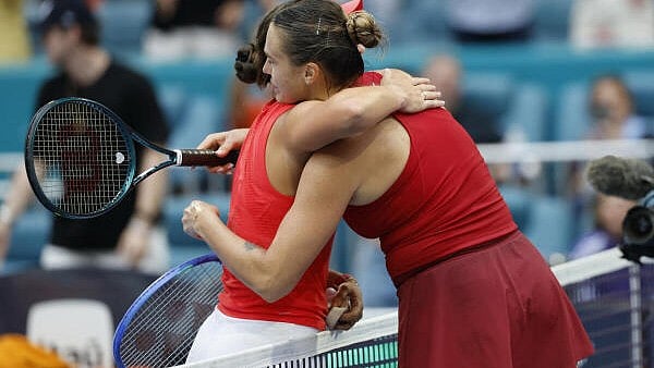 <div class="paragraphs"><p> Aryna Sabalenka (R) hugs Jessica Pegula (USA)(L) at the net after their match in the women's singles championship of the Miami Open at Hard Rock Stadium.</p></div>