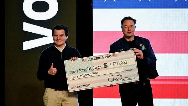 <div class="paragraphs"><p>US President Donald Trump's adviser Elon Musk gives a check to an audience member during a rally in support of a conservative state Supreme Court candidate of an April 1 election in Green Bay, Wisconsin</p></div>