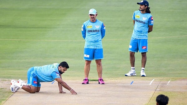 <div class="paragraphs"><p>Lucknow Super Giants’ captain and wicketkeeper Rishabh Pant, left, inspects the pitch during a practice session</p></div>