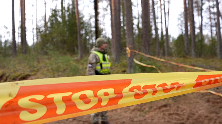 <div class="paragraphs"><p>A soldier stands next to cordon tape at the scene of a rescue operation at Pabrade training ground, in Lithuania, March 31, 2025. </p></div>