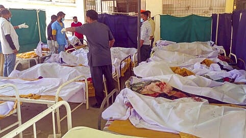 <div class="paragraphs"><p>Injured people undergo treatment at a hospital after a blast at a firecracker warehouse led to a blaze and collapse of the building, in Gujarat's Banaskantha district.</p></div>