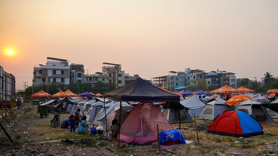 <div class="paragraphs"><p>People take shelter in a makeshift tent camp, following a strong earthquake in Mandalay, Myanmar, April 1, 2025. </p></div>