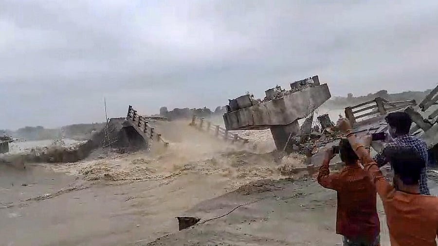 <div class="paragraphs"><p>A collapsed bridge in Bihar's Araria.</p></div>