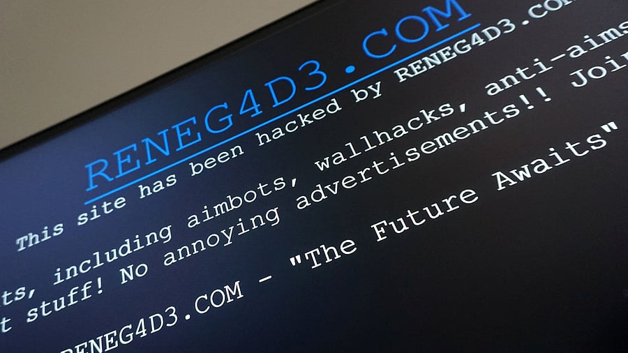 <div class="paragraphs"><p>The words "This site has been hacked by RENEG4DE.COM" are displayed on the archived site of a rival video game cheating website in this April 1, 2025 screenshot. </p></div>
