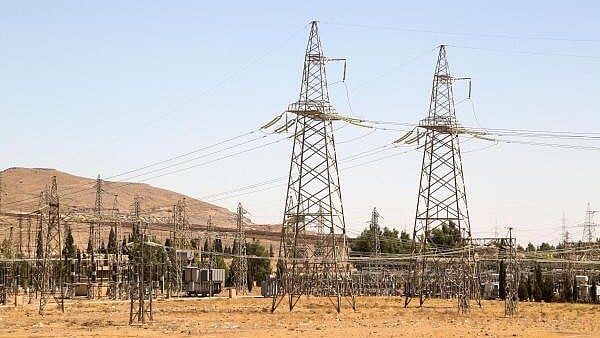 <div class="paragraphs"><p>A view shows electricity pylons in Kiswah, Damascus suburbs, Syria.</p></div>