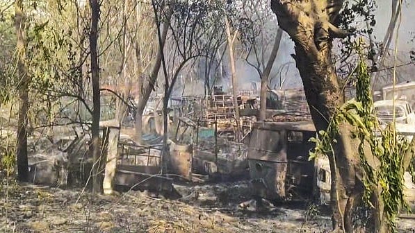 <div class="paragraphs"><p>Charred remains at the site after a fire broke out at a vehicle depot, at Nehru Place area in New Delhi, Thursday, April 3, 2025.</p></div>