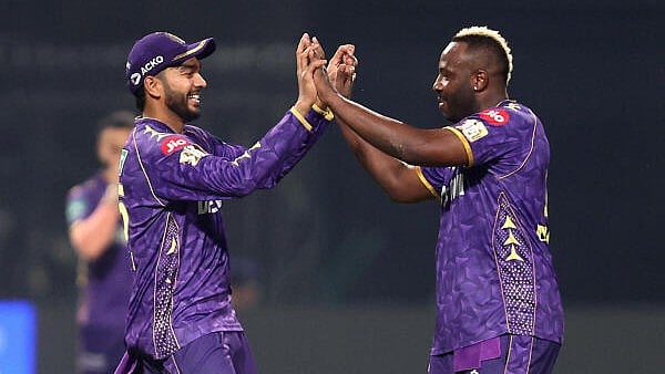<div class="paragraphs"><p>Kolkata Knight Riders' Andre Russell celebrates with teammates after taking the wicket of Sunrisers Hyderabad's Harshal Patel.</p></div>