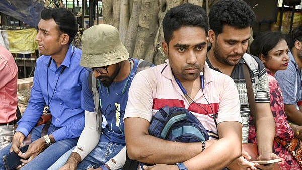 <div class="paragraphs"><p>Employees of West Bengal government schools react after the Supreme Court upheld the Calcutta High Court's verdict invalidating the appointment of 25,753 teachers and other staff in West Bengal state-run and state-aided schools, in Kolkata, Thursday, April 3, 2025.</p></div>