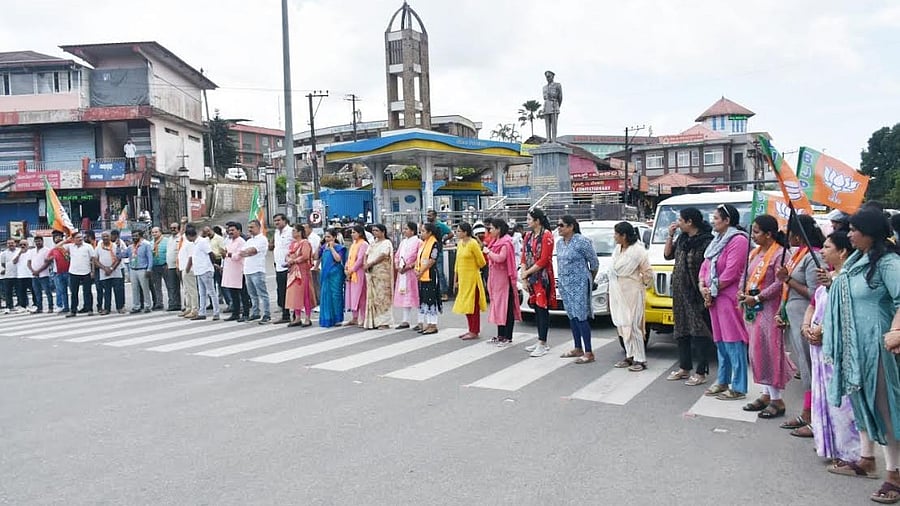 <div class="paragraphs"><p>BJP members stage a protest at General Thimmayya Circle in Madikeri.</p></div>