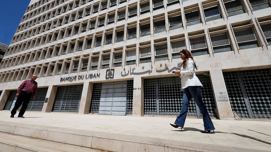 <div class="paragraphs"><p>People walk outside Lebanon's Central Bank building in Beirut, Lebanon April 4, 2025. </p></div>