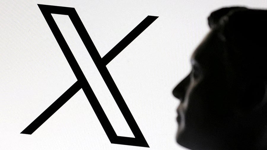 <div class="paragraphs"><p>A 3D-printed miniature model of Elon Musk and the X logo </p></div>