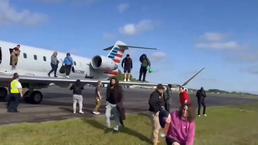 <div class="paragraphs"><p>A screengrab from the video showing passengers being evacuated</p></div>