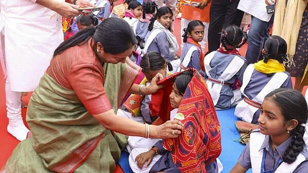 <div class="paragraphs"><p>In this screengrab from a video posted by @gupta_rekha via X on Saturday, April 5, 2025, Delhi Chief Minister Rekha Gupta performs ‘kanya pujan’ on the occasion of ‘maha ashtami’ during ‘Chaitra Navratri’ festival, at Rajkiya Sarvodaya Kanya Vidyalaya, Shalimar Bagh, in New Delhi.</p></div>
