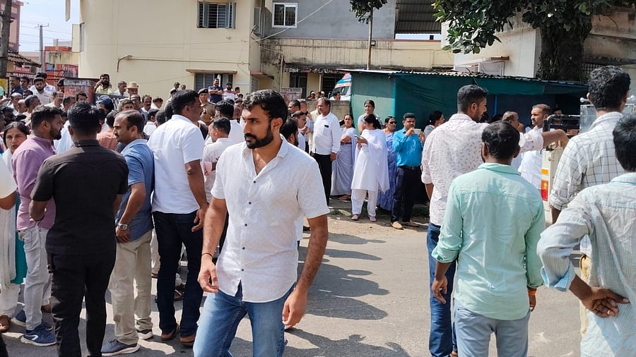 <div class="paragraphs"><p>People gathered outside community health centre at Kushalngar. </p></div>