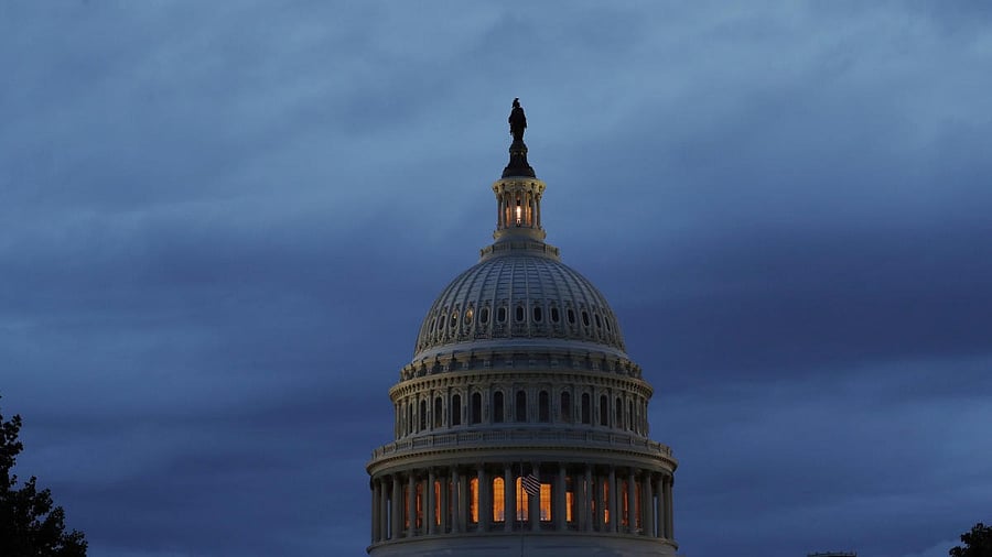 <div class="paragraphs"><p>Storm clouds swirl over the US` Capitol building in Washington</p></div>