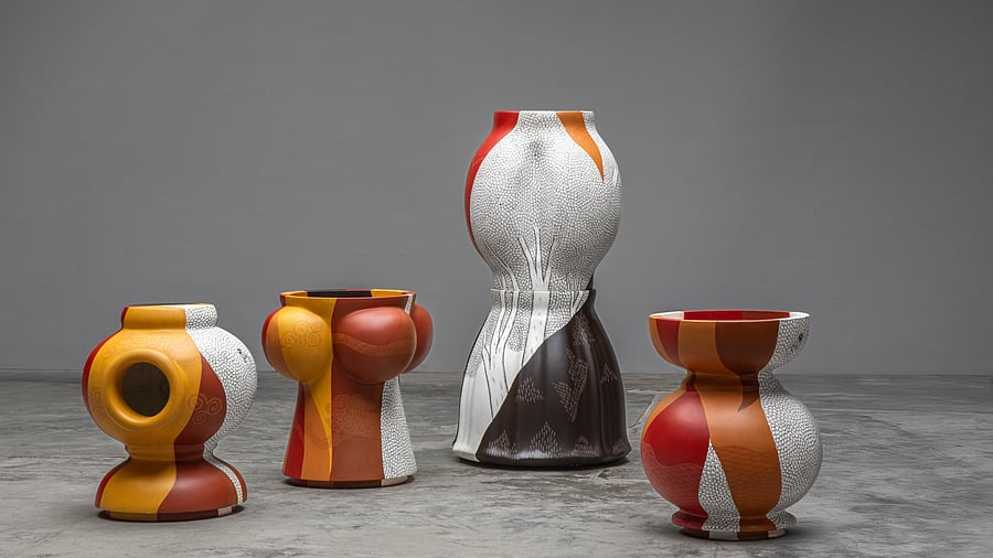 A collection of sculptural tables, each embodying one of the five elements.