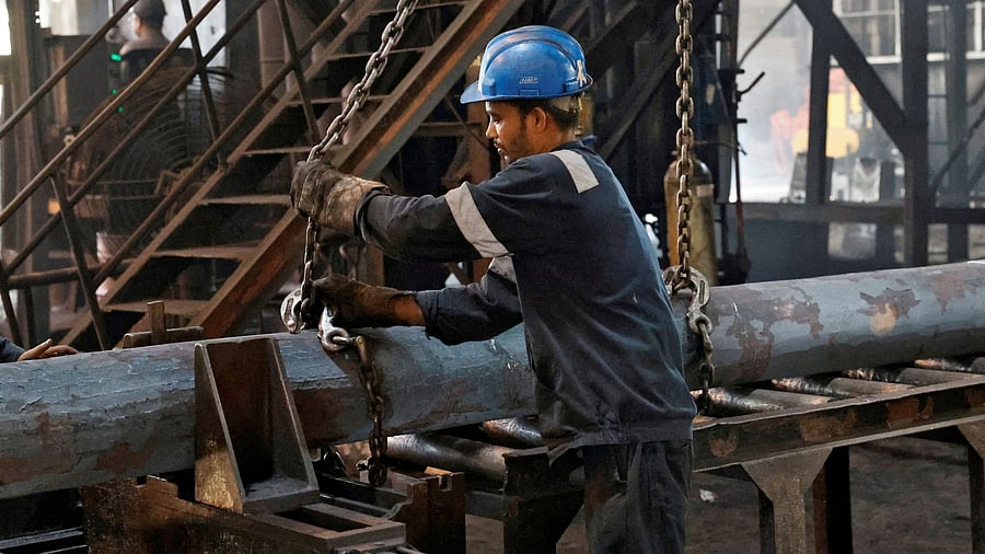 <div class="paragraphs"><p>An employee prepares to move a heavy bar of steel inside a factory in Hooghly district in the West Bengal, India, April 26, 2024. For representational purposes.</p></div>