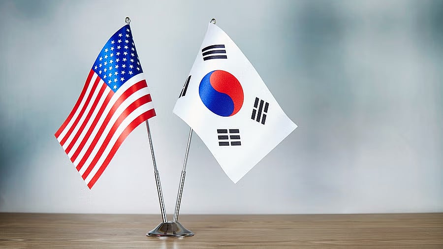 <div class="paragraphs"><p>The flags of the US and South Korea.</p></div>