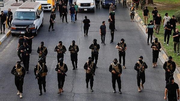 <div class="paragraphs"><p>Members of the Iraq's Kataib Hezbollah armed group. Representative image.</p></div>