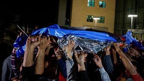 <div class="paragraphs"><p>Palestinians carry the body of Palestinian-American boy Omar Mohammad Rabea,14, who was killed by Israeli forces in Turmus Ayya village, near Ramallah.</p></div>