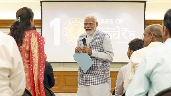 <div class="paragraphs"><p>Prime Minister Narendra Modi interacts with beneficiaries of the Pradhan Mantri MUDRA Yojana.</p></div>