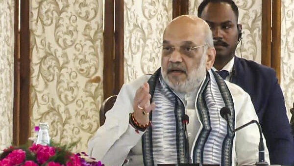 <div class="paragraphs"><p>nion Home Minister Amit Shah chairs a meeting to review developmental projects, in Srinagar.</p></div>