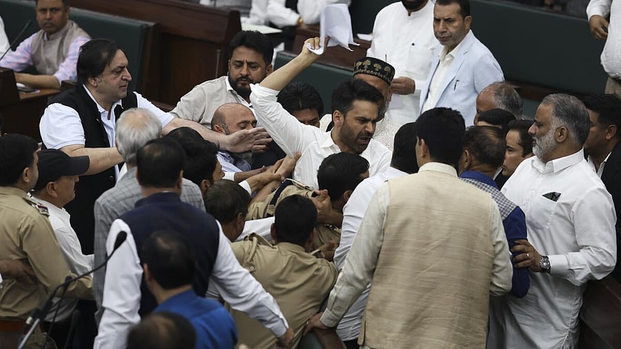 <div class="paragraphs"><p>MLAs raise slogans during the Budget session of the J&amp;K Assembly, in Jammu, Tuesday, April 8, 2025.</p></div>