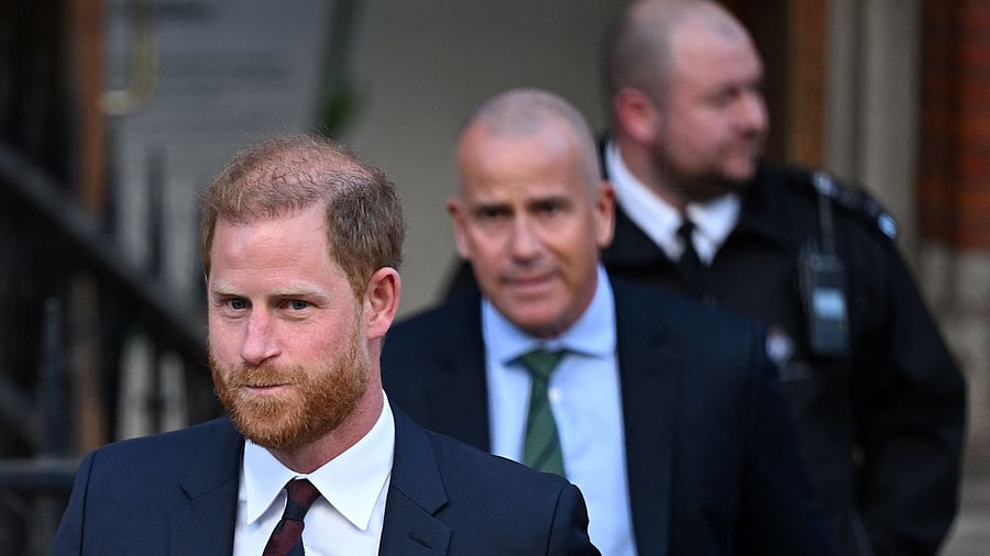 <div class="paragraphs"><p>Britain's Prince Harry gestures as he departs after attending his appeal against the rejection of his legal challenge to the British government's decision to take away his police protection when he is in Britain, outside the High Court in London, Britain, April 9, 2025.</p></div>