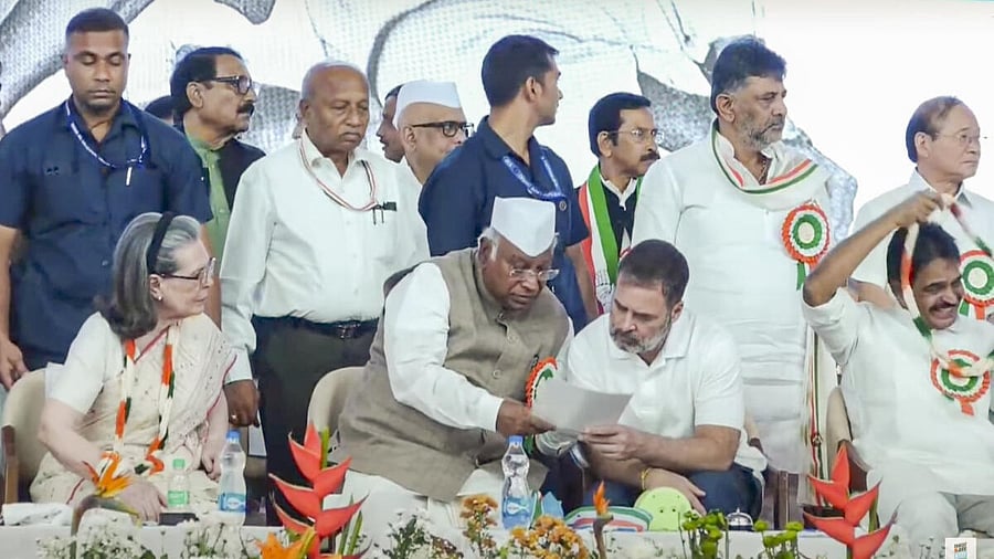 <div class="paragraphs"><p>Rahul Gandhi with Congress chief Mallikarjun Kharge and other leaders during the AICC session in Ahmedabad.&nbsp;&nbsp;</p></div>