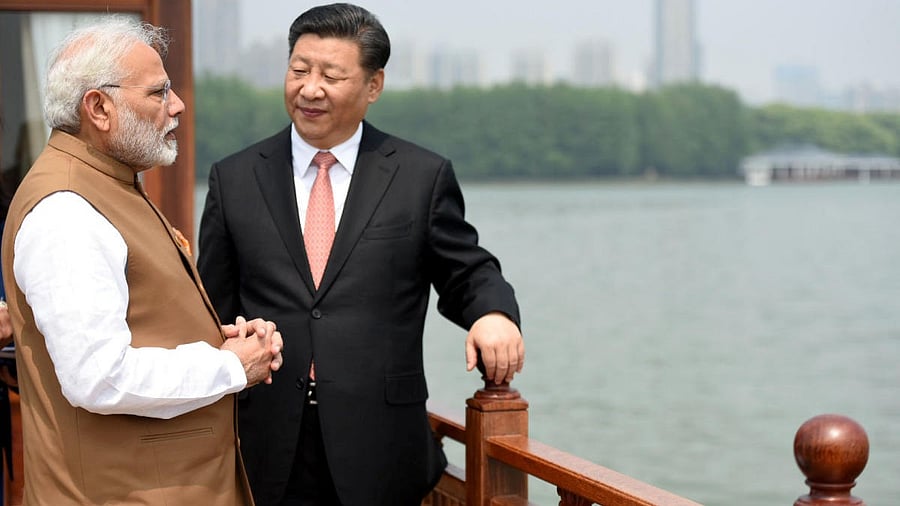 <div class="paragraphs"><p>Modi and Xi Jinping</p></div>