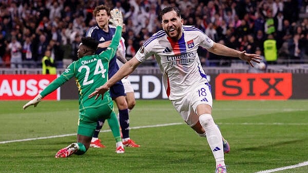 <div class="paragraphs"><p>Olympique Lyonnais' Rayan Cherki celebrates scoring their second goal</p></div>