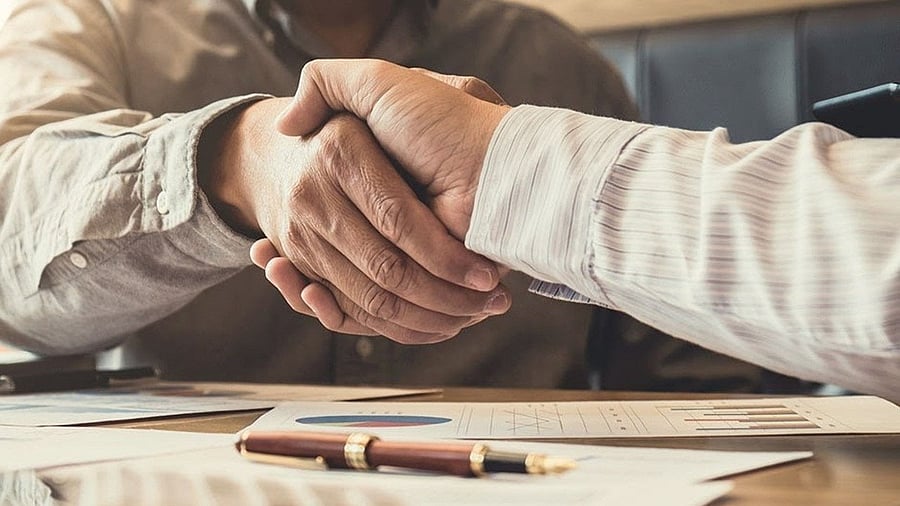 <div class="paragraphs"><p>Representative image showing a deal being made.</p></div>