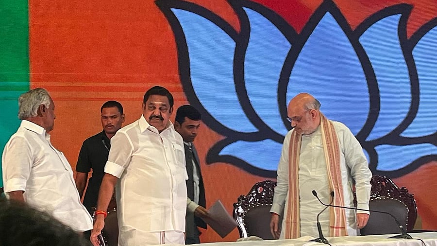 <div class="paragraphs"><p>Amit Shah with Edappadi K Palaniswami (centre). </p></div>