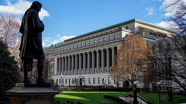 <div class="paragraphs"><p>People stand on campus at Columbia University in New York City</p></div>