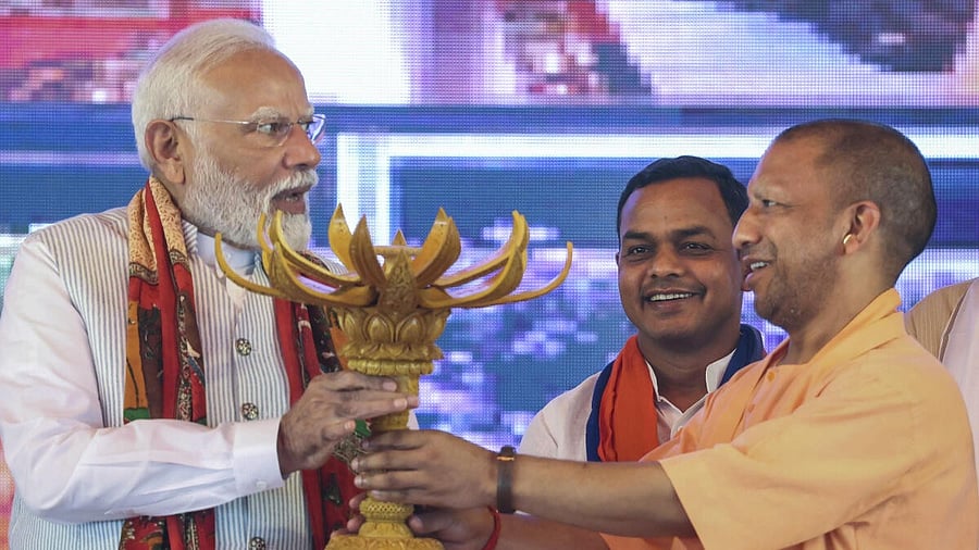 <div class="paragraphs"><p>Prime Minister Narendra Modi being presented a memento by UP CM Yogi Adityanath during foundation stone laying and inauguration of development works at Mehadiganj, in Varanasi, Friday, Apr. 11, 2025.</p></div>