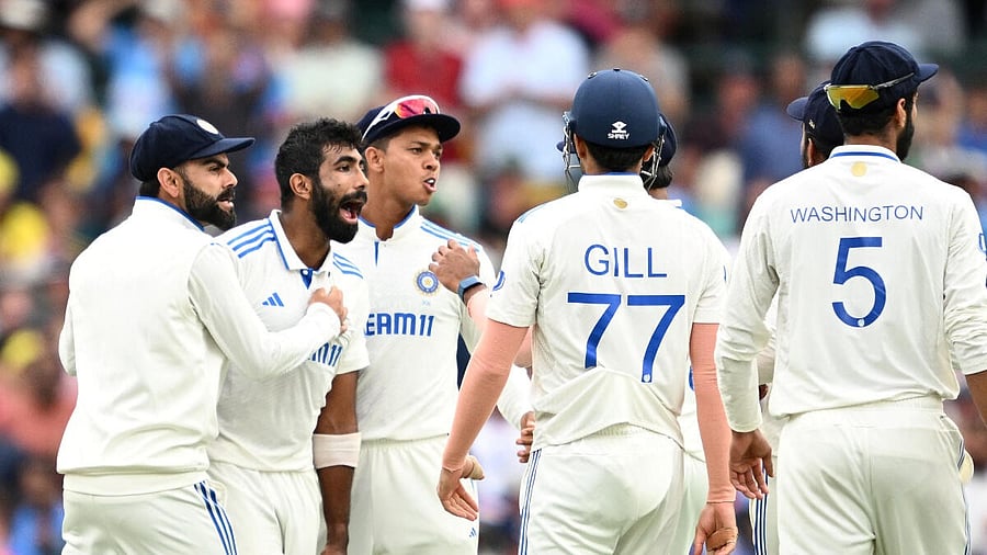 <div class="paragraphs"><p>India's Jasprit Bumrah celebrates with teammates after taking the wicket of Australia's Usman Khawaja.</p></div>
