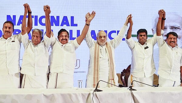 <div class="paragraphs"><p>Union Home Minister Amit Shah with AIADMK general secretary Edappadi K Palaniswami, Tamil Nadu BJP President K Annamalai and others during a press conference, in Chennai, Friday, April 11, 2025. AIADMK and BJP announced alliance for Tamil Nadu's 2026 polls while Nainar Nagendran is all set to become the next state chief of the BJP, succeeding K Annamalai. </p></div>