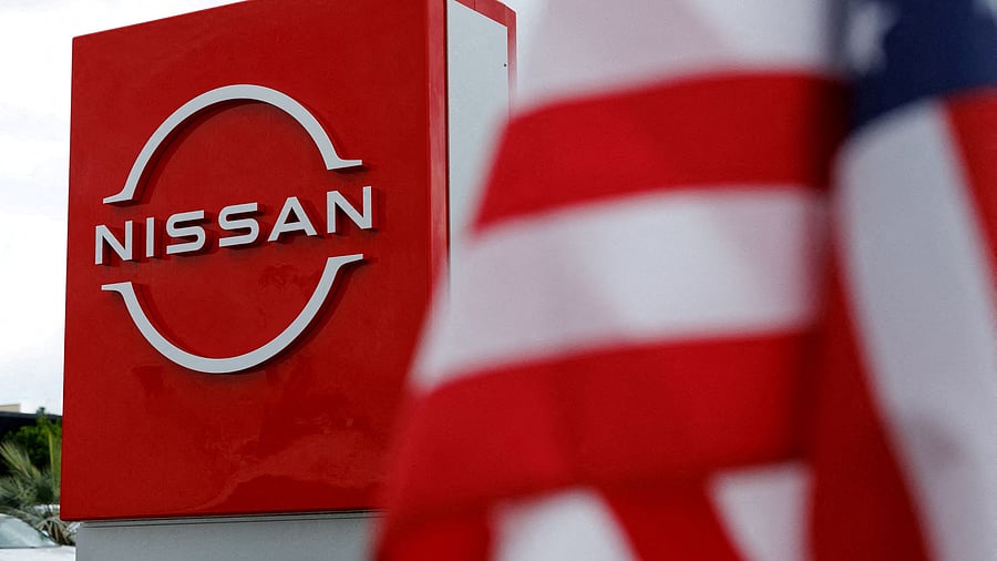 <div class="paragraphs"><p>The American flag flutters at a Nissan automobile dealership in Irvine, California, US, March 27, 2025. </p></div>