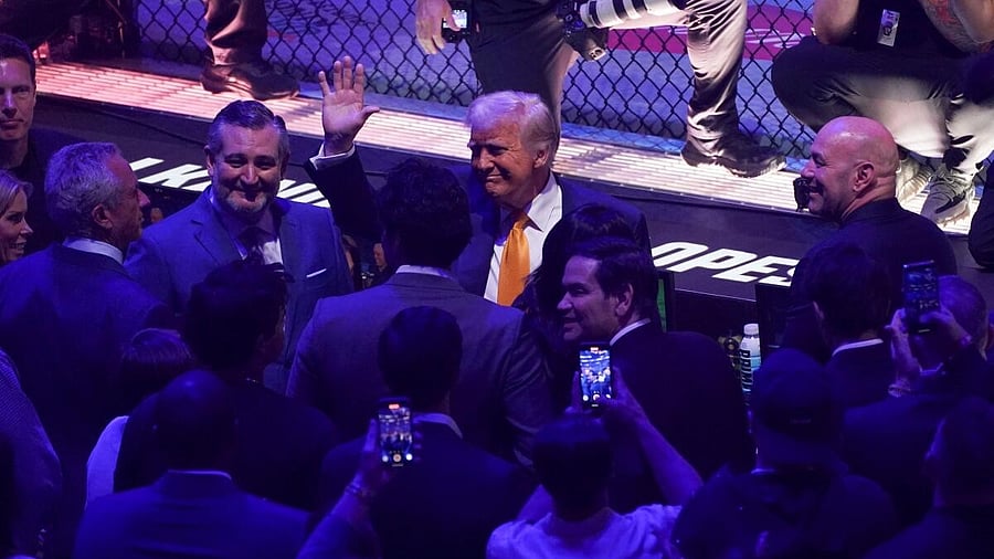 <div class="paragraphs"><p>US President Donald Trump gestures alongside Dana White, CEO of the Ultimate Fighting Championship, ahead of UFC 314 at the Kaseya Center, Miami Florida.</p></div>