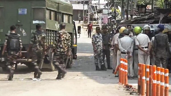 <div class="paragraphs"><p>Security forces personnel guard in a violence-hit area, in Murshidabad district, Sunday, April 13, 2025. Violence erupted in the area following protests over Waqf Act.</p></div>