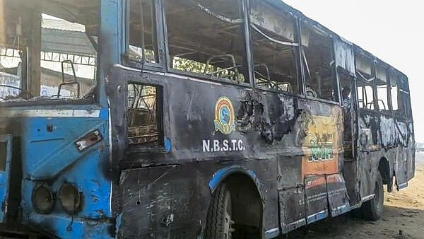 <div class="paragraphs"><p>A charred bus after violent clashes following protests over Waqf Act at Jangipur, in Murshidabad district. </p></div>