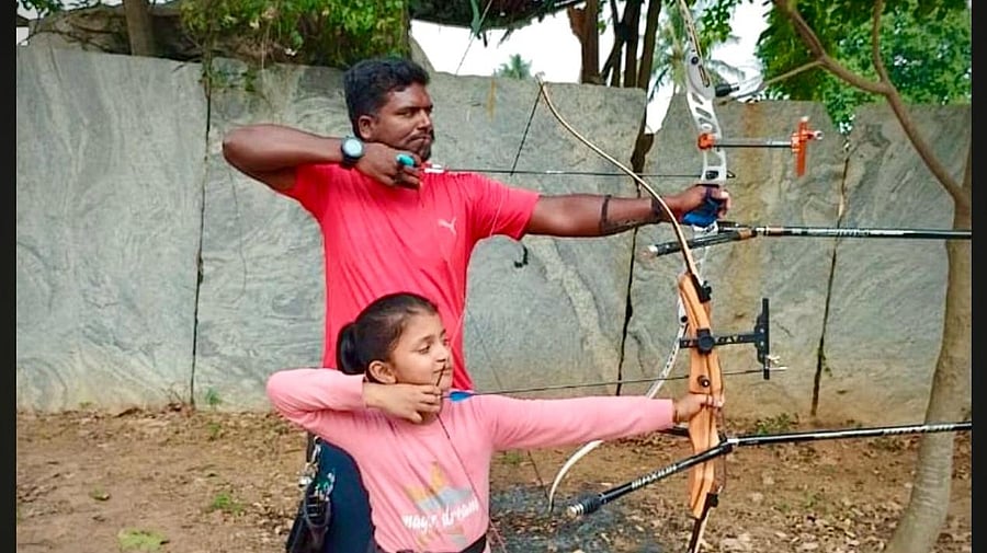 Aanya shooting with coach Subash.
