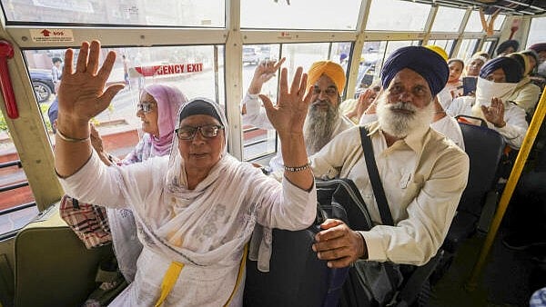 <div class="paragraphs"><p>Sikh pilgrims leave for Pakistan to celebrate the Baisakhi festival, in Amritsar. </p></div>