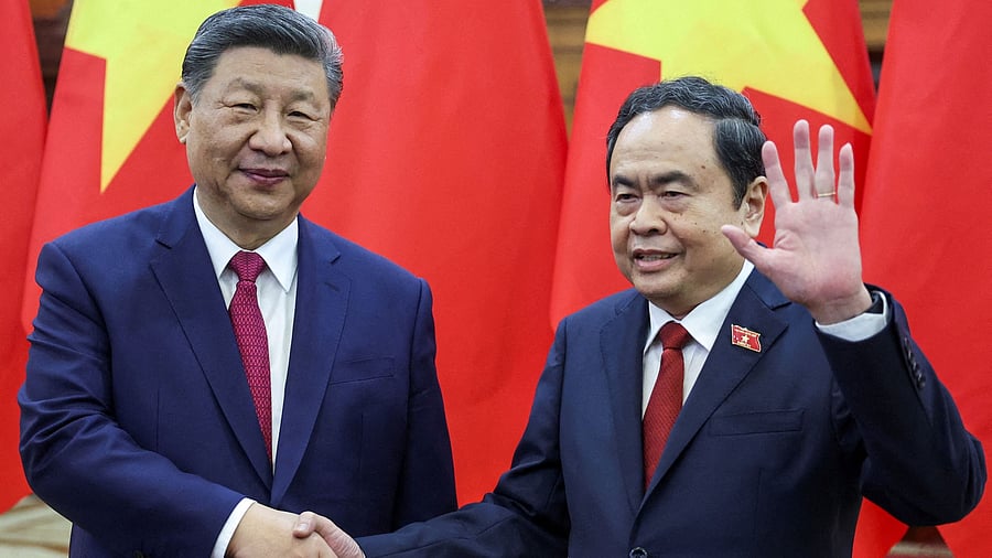<div class="paragraphs"><p>Chinese President Xi Jinping shakes hands with Vietnam's National Assembly Chairman Tran Thanh Man, in Hanoi, Vietnam, April 14, 2025. </p></div>