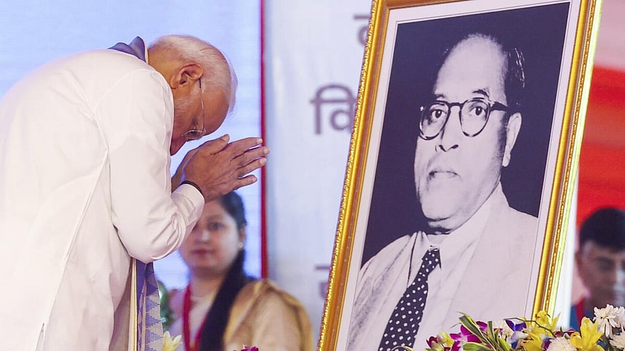 <div class="paragraphs"><p>Prime Minister Narendra Modi pays tribute to B R Ambedkar</p></div>