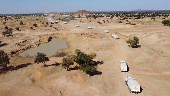 <div class="paragraphs"><p></p></div><div class="paragraphs"><p>A drone view shows World Food Program (WFP) trucks transporting food and nutrition supplies from Chad to ZamZam Camp in Darfur, Sudan, in Adre</p></div>