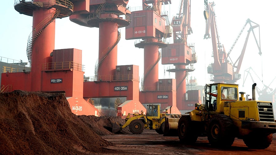 <div class="paragraphs"><p>Workers transport soil containing rare earth elements for export at a port in Lianyungang, Jiangsu province, China.</p></div>