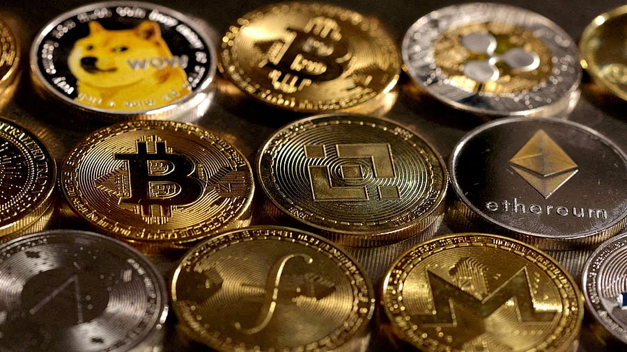 <div class="paragraphs"><p>Representations of cryptocurrencies are seen in this illustration</p></div>