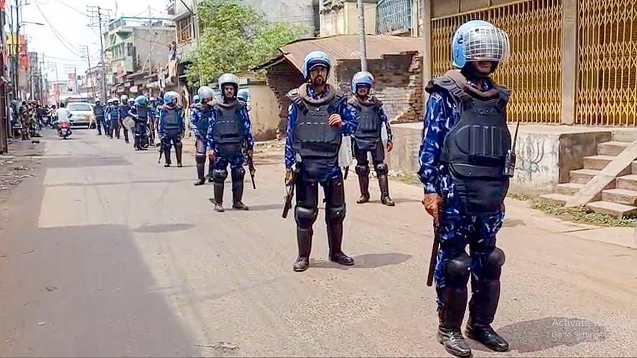 <div class="paragraphs"><p>Security personnel stand guard in a violence-affected area, in Murshidabad district, West Bengal, Monday, April 14, 2025. </p></div>
